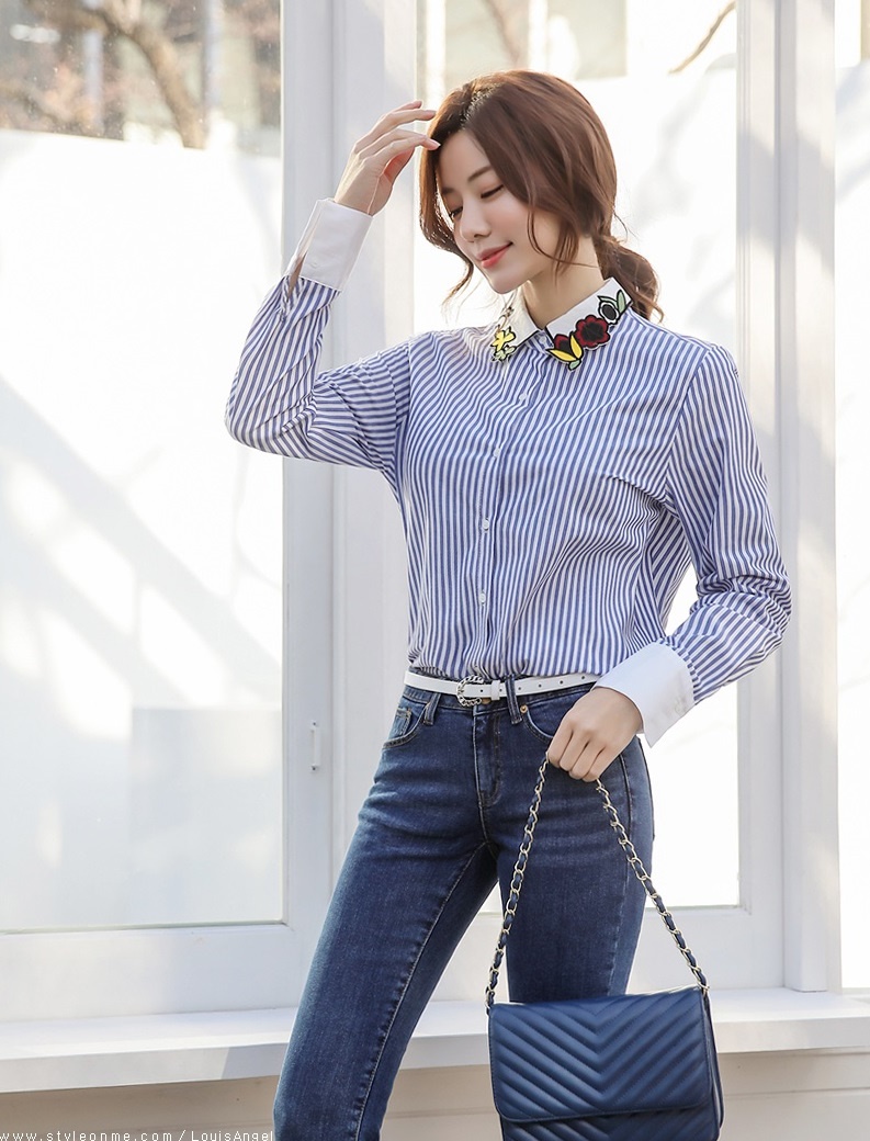 Nếu bạn là một cô nàng công sở xinh đẹp, thích sự đơn giản thì đây chính là sự gợi ý không hề tồi cho bạn với chiếc áo sơ mi dài tay sọc kẻ này.  