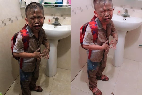 Cậu bé mếu máo sau khi bị ngã xuống ruộng.