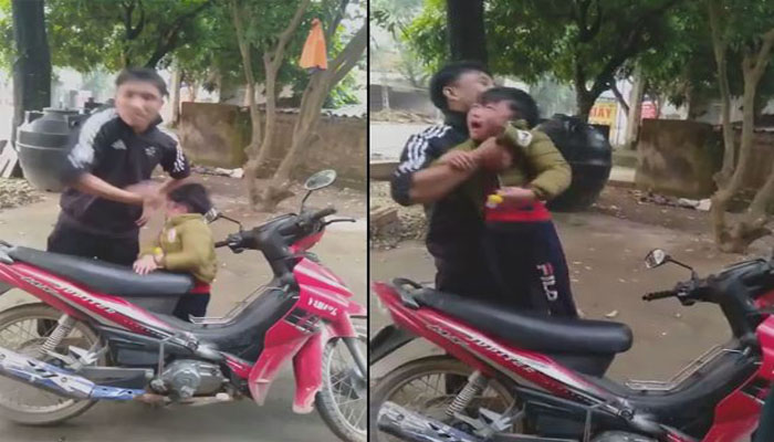 Cậu bé khóc thét khi bị bố tát.