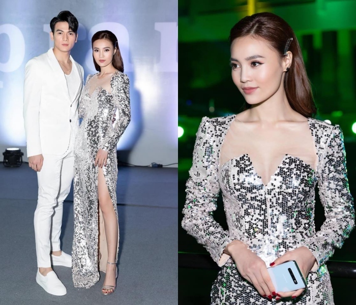 Ninh Dương Lan Ngọc thu hút mọi ánh nhìn trong thiết kế đầm sequins xẻ độc đáo. Điểm nhấn lớn của thiết kế chính là cầu vai ngang và phần eo chít lại tạo một hình tam giác ngược lôi cuốn. Bên cạnh đó, đường cắt sắc sảo phần ngực thiết kế để lộ xương quai xanh gợi cảm cũng giúp nữ diễn viên ghi điểm khi xuất hiện tại một sự kiện trong bộ cánh này.  