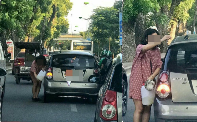 Cô gái thản nhiên dừng xe đổ xăng giữa đường.