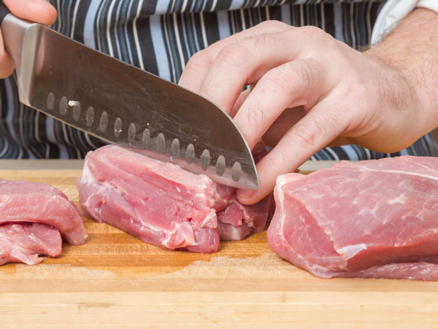 chefs-20knife-20cutting-20through-20meat-1498022931753