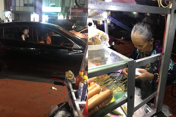 Nhóm thanh niên vứt rác trước xe bán hàng của một bà cụ.