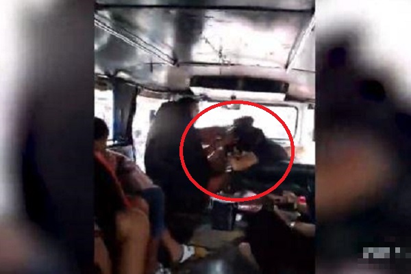Cô vợ lao vào đánh chồng và nhân tình của chồng trên xe.