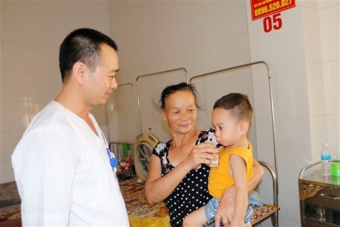 Bé K được cứu khỏe mạnh trở lại