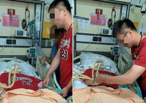Anh chàng đeo nhẫn lên tay bạn gái.