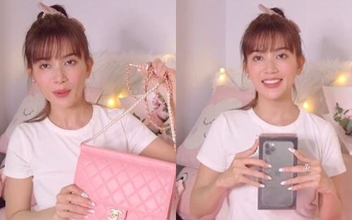 Sĩ Thanh quay clip ''đập hộp'' những món quà hàng hiệu bạn trai tặng.