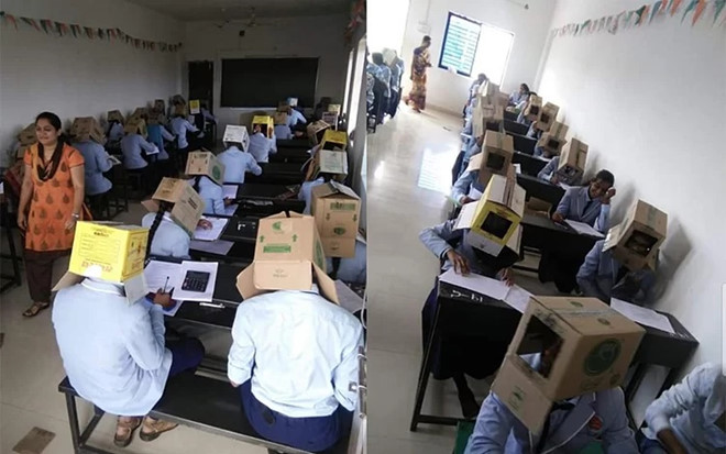 Hàng chục Mừng SHBET phiên bản mới 2025 đội thùng carton làm bài thi.
