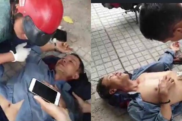 Người đàn ông bị đôi nam nữ hành hung trên đường.