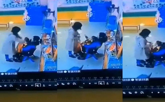 Bé gái mầm non bị cô giáo bạo hành không thương tiếc. Hình ảnh cắt từ clip.
