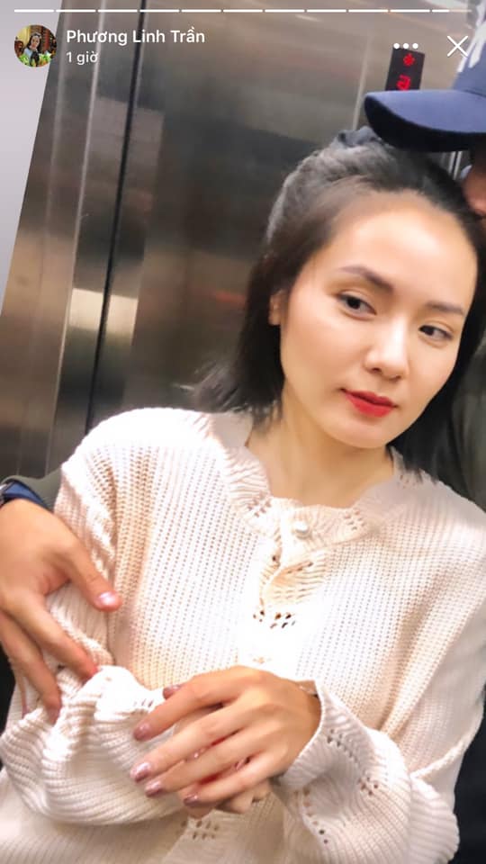 Phương Linh khoe ảnh với một người đàn ông giấu mặt.