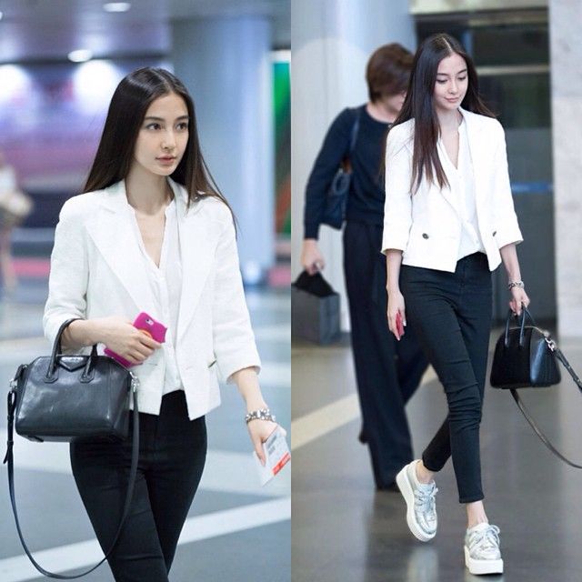 Bà mẹ 1 con cũng có lúc nhìn thanh lịch dịu dàng như thế này với skinny jean đen kết hợp sơ mi trắng và jacket trắng