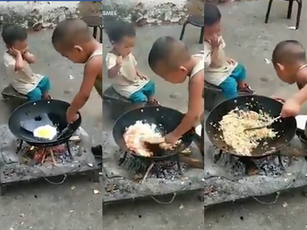 Cậu bé chiên cơm vô cùng chuyên nghiệp. Hình ảnh cắt từ clip.
