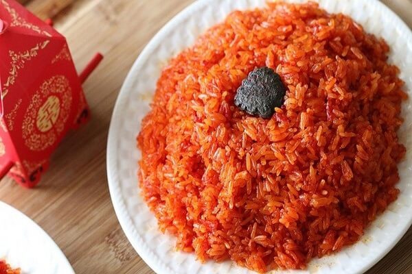 Ăn xôi gấc đầu tháng đỏ thắm