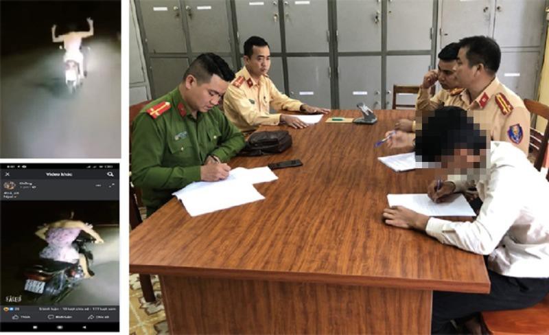 Thanh niên mặc váy hồng buông 2 tay, không đội mũ bảo hiểm khi đi xe máy