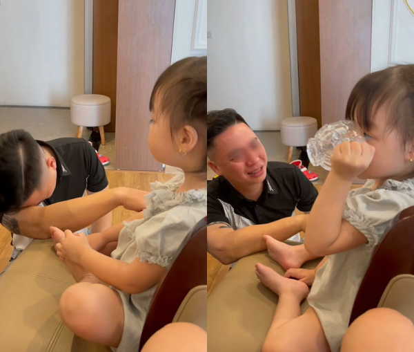 Trong khi ông bố khóc thương không ngừng, cô con gái lại dửng dưng uống sữa