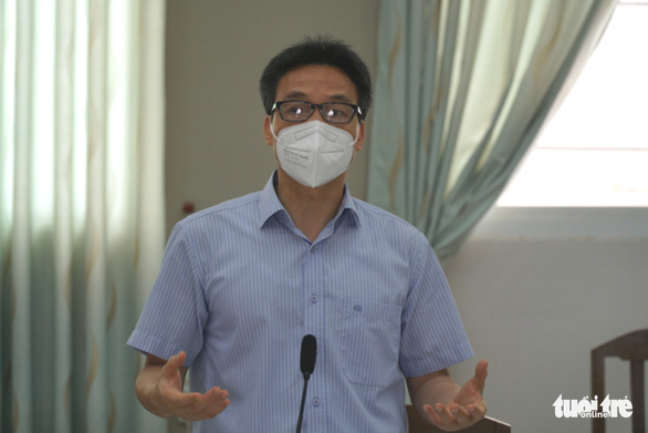 Phó Thủ tướng Vũ Đức Đam tại buổi làm việc với Ban chỉ đạo phòng chống dịch Covid-19 quận 4 (Ảnh: Tuổi trẻ)