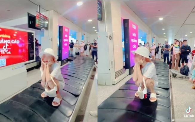 Một hành khách ngồi lên băng chuyền hành lý để quy phim, chụp hình và đăng lên mạng xã hội. 
