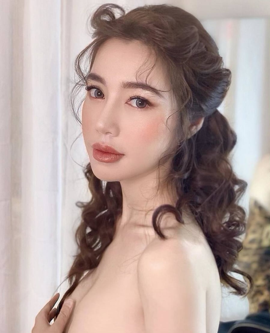 elly-tran-la-ai-tieu-su-su-nghiep-doi-tu-cua-elly-tran-9365ff0c