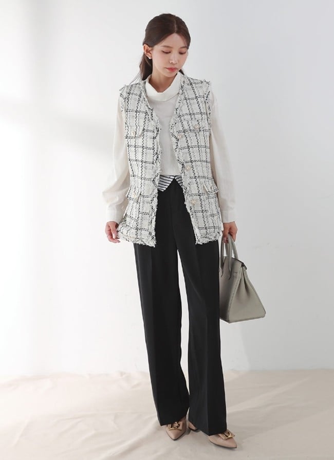 Những chiếc áo gile vải tweed có thể mix với bất cứ Shbet999 com đăng nhập nào, từ váy liền đến sơ mi, quần âu
