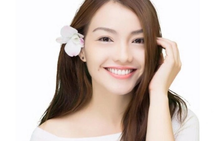 Phụ nữ có hàm răng trắng và đều. (Ảnh minh họa)