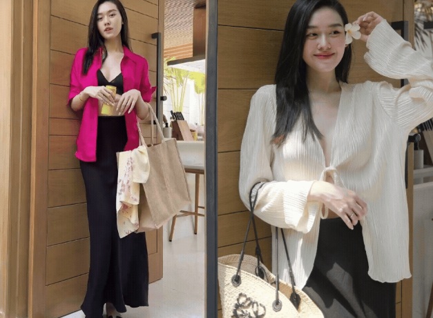 Áo sơ mi hồng đậm, chân váy lụa iúp cân bằng tổng thể Shbet999 com đăng nhập. 