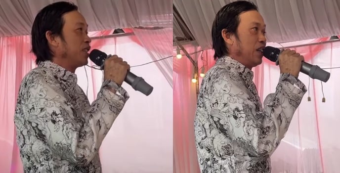 Nam nghệ sĩ diện Shbet999 com đăng nhập áo dài truyền thống, hát tại Quatrian shbet hiện đang mở ở miền Tây.