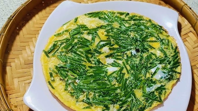 Từng miếng trứng chiên hẹ mềm ngọt thơm nức không chỉ ngon miệng, ngon cơm mà còn giúp tăng cường sức đề kháng cho Sh88bet đăng ký miễn phí.  