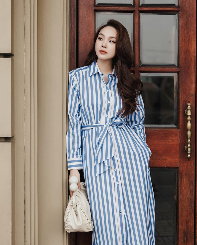 Minh Hằng cũng gợi ý một outfit vừa thanh lịch, vừa trẻ trung với váy sơ mi họa tiết.