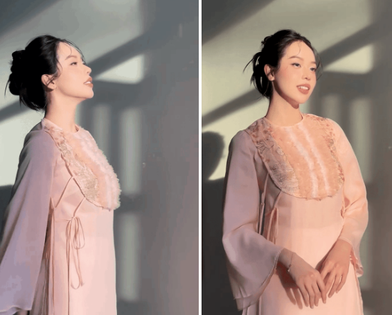 Thanh Thủy lựa chọn áo dài thiết kế tay loe, điểm nhấn là phần ngực áo đính kim sa nổi bật. 