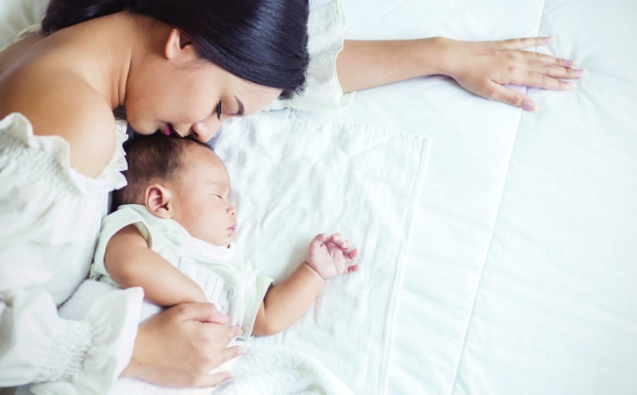 Phụ nữ sinh đủ 2 con trước năm 35 tuổi được nhận trợ cấp như thế nào?