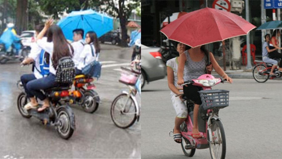 Đi xe đạp,xe đạp máy cầm ô dù cũng bị CSGT xử phạt