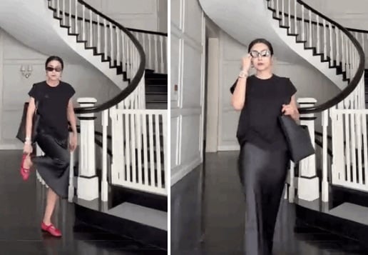 Cô từng khiến công chúng trầm trồ khi diện set đồ đen toàn tập gồm áo, váy lụa và khéo léo kết hợp cùng đôi giày lưới đỏ rực