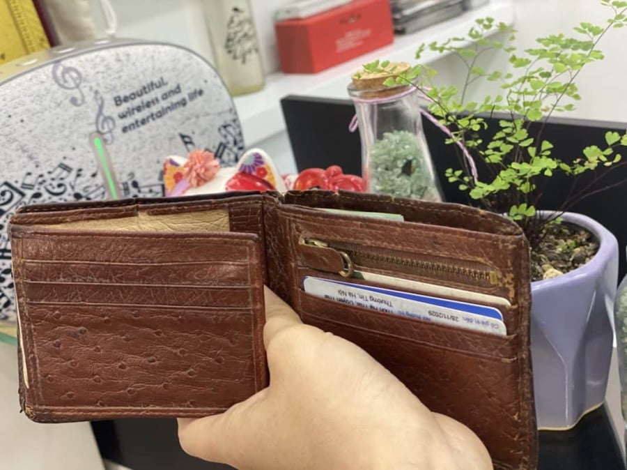 Ví tiền hoặc túi đựng tiền đã qua sử dụng    