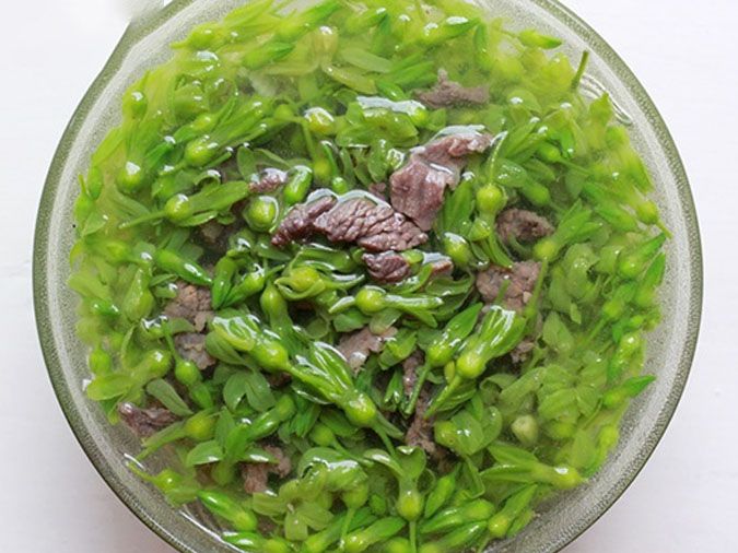 Hoa thiên lý thường xuất hiện trong bữa cơm mùa hè