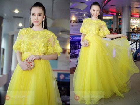 Chiếc váy vàng thướt tha, bay bổng như công chúa.