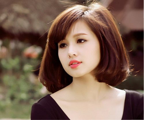 Tâm Tít mang một vẻ đẹp dịu dàng, đằm thắm với tóc ngắn.