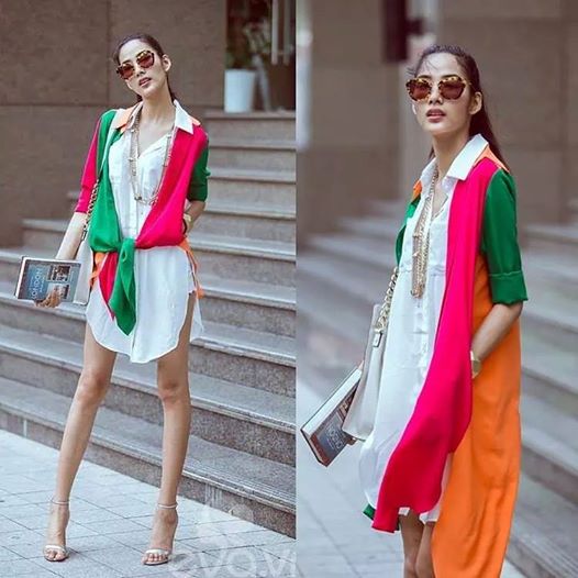Hoàng Thùy sành điệu với áo khoác nhiều màu của NTK Đỗ Mạnh Cường.
