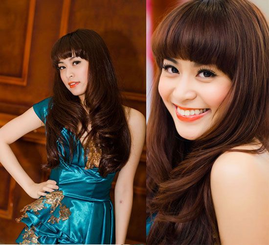 Mái tóc xoăn dài bồng bềnh giúp tôn thêm khuôn mặt đầy đặn của Hoàng Thùy Linh