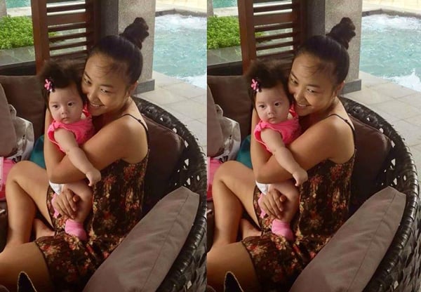 Đoan Trang rất cưng nựng con gái yêu của mình.