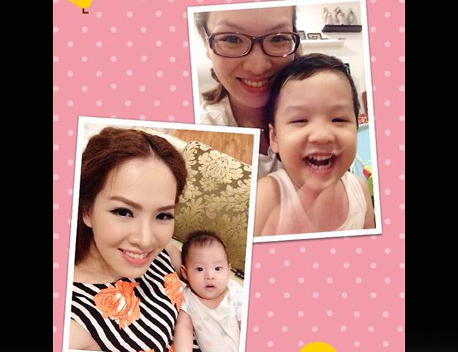 Mẹ con nhà Đan Lê ttaoj dáng đáng yêu khi chụp ảnh.