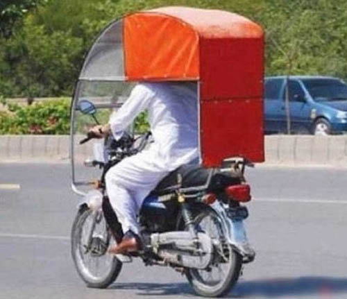 Có xe máy như này chẳng sợ mưa nắng.