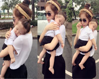 Con gái Elly Trần ngủ ngon trong vòng tay của mẹ