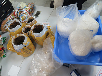 Giấu 3 kg ma túy trong hộp mắm, cụ bà bị bắt ở sân bay