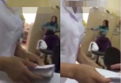 Đề nghị xác minh video nhân viên viện K nhận cả tập phong bì