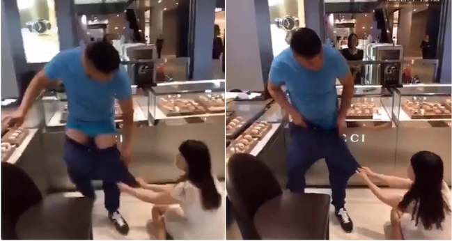 Cô gái tụt quần bạn trai giữa cửa hàng, ăn vạ đòi mua đồng hồ xịn