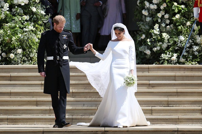 Meghan rạng rỡ trong váy cưới. Ảnh: Internet