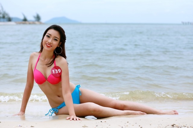 15029666133236-can-canh-nhan-sac-goi-cam-khi-dien-bikini-cua-tan-hoa-hau-vn_281021690