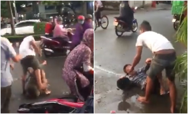 Sau đó, chứng kiến việc bất bình, một thanh niên đã xông ra đánh túi bụi gã đàn ông kia