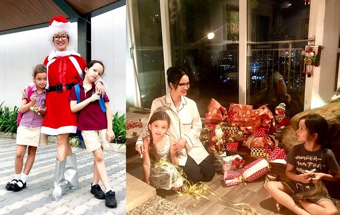 Trong mùa Giáng sinh thiếu vắng người chồng/người bố đầu tiên, diva Hồng Nhung cố gắng mang đến không khí ấm áp nhất cho hai con gái. Không chỉ trang hoàng nhà cửa, nữ ca sĩ còn cùng hai con song sinh gói quà tặng các bạn nhỏ và hoá thân thành 